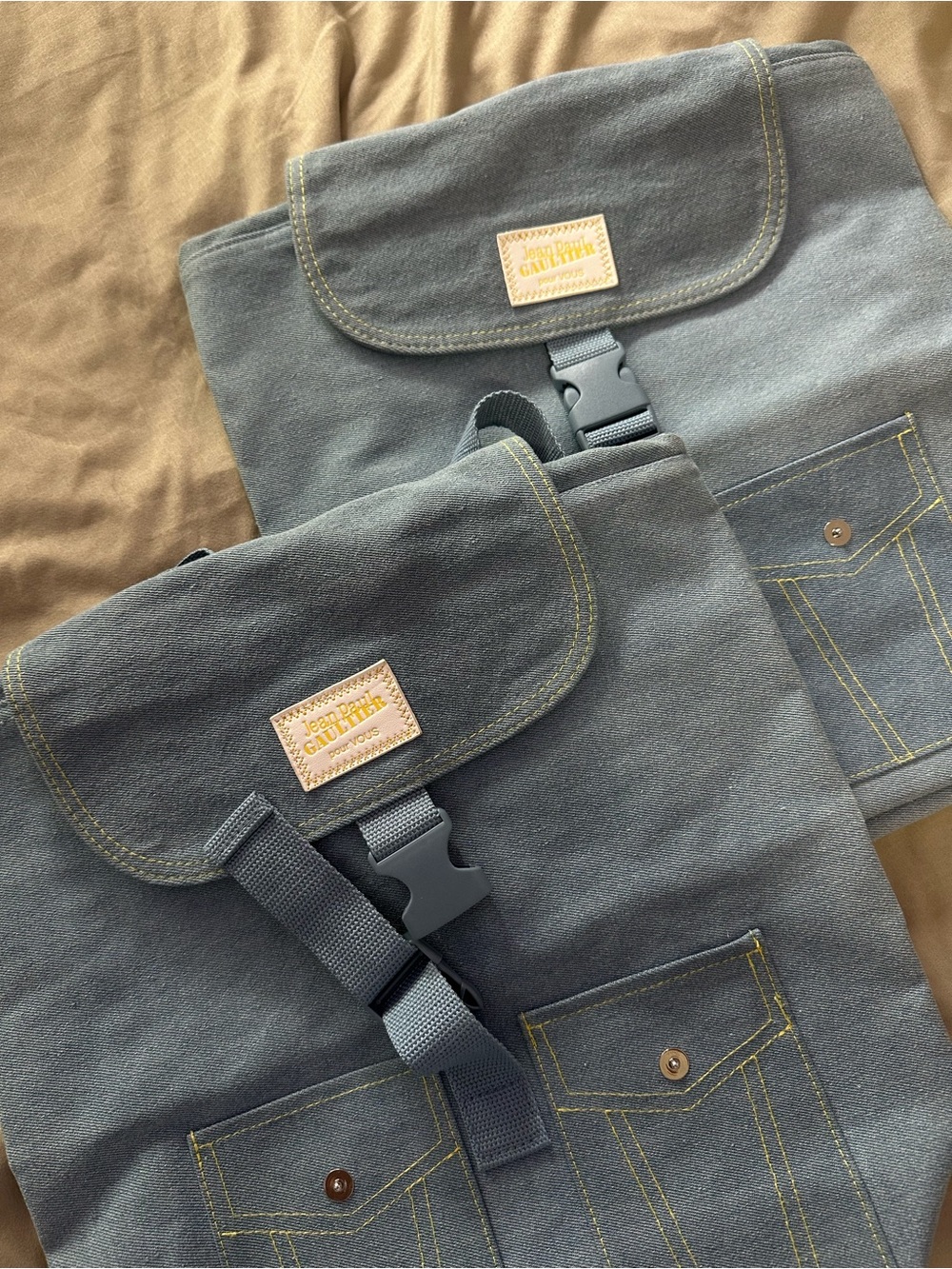 Jean Paul Gaultier Light Blue Denim Flap Backpack with Yellow Stitching